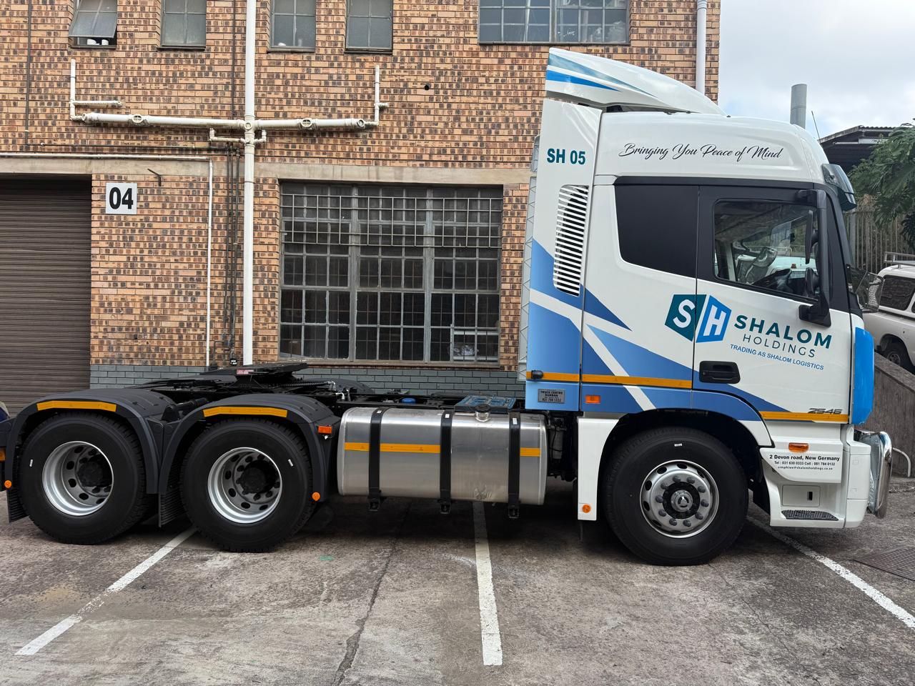 Shalom Logistics truck in the yard at New Germany